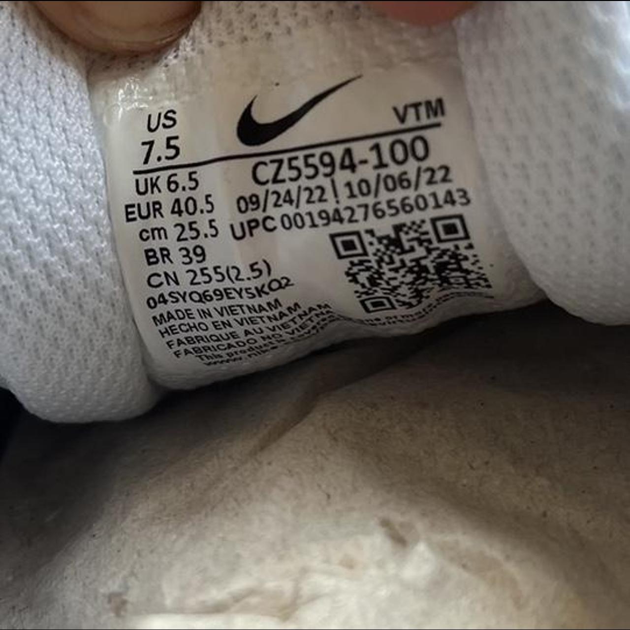 triple white nike trainers