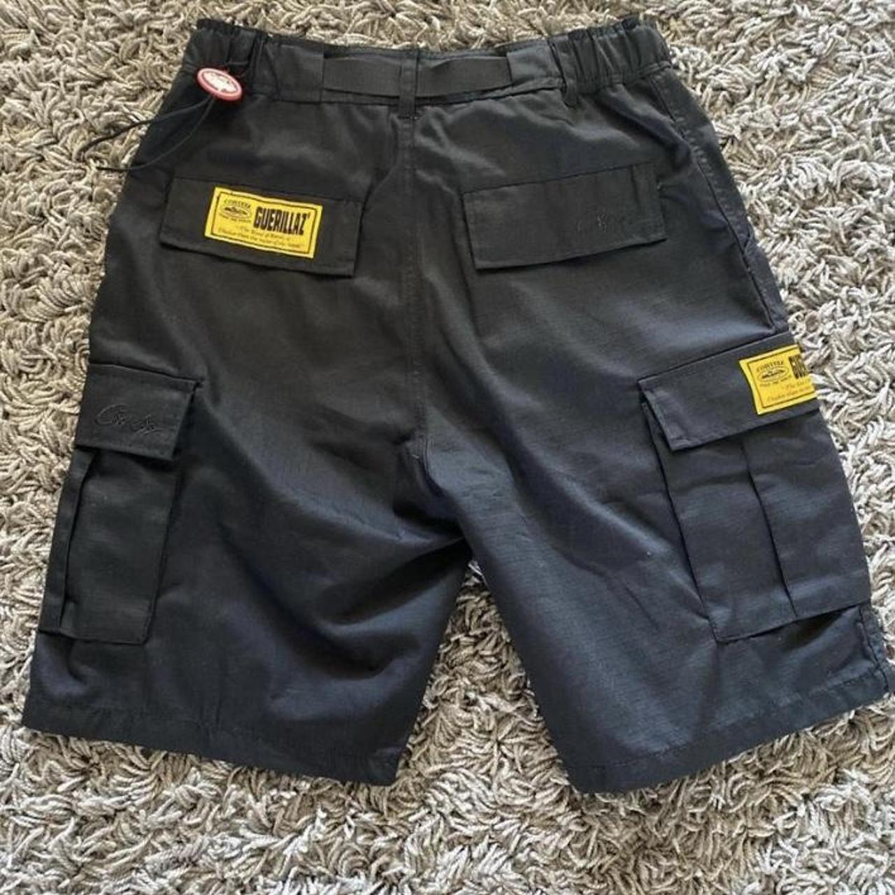 Corteiz cargo shorts triple black. Size small men’s.... - Depop