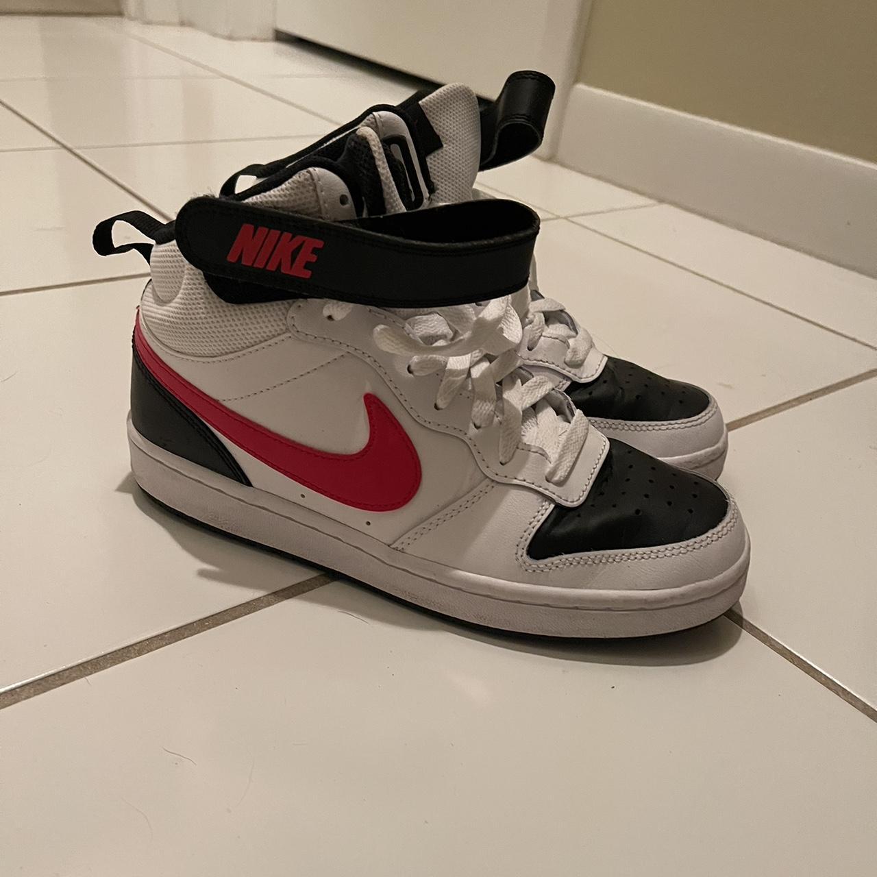 half red half white nike shoes