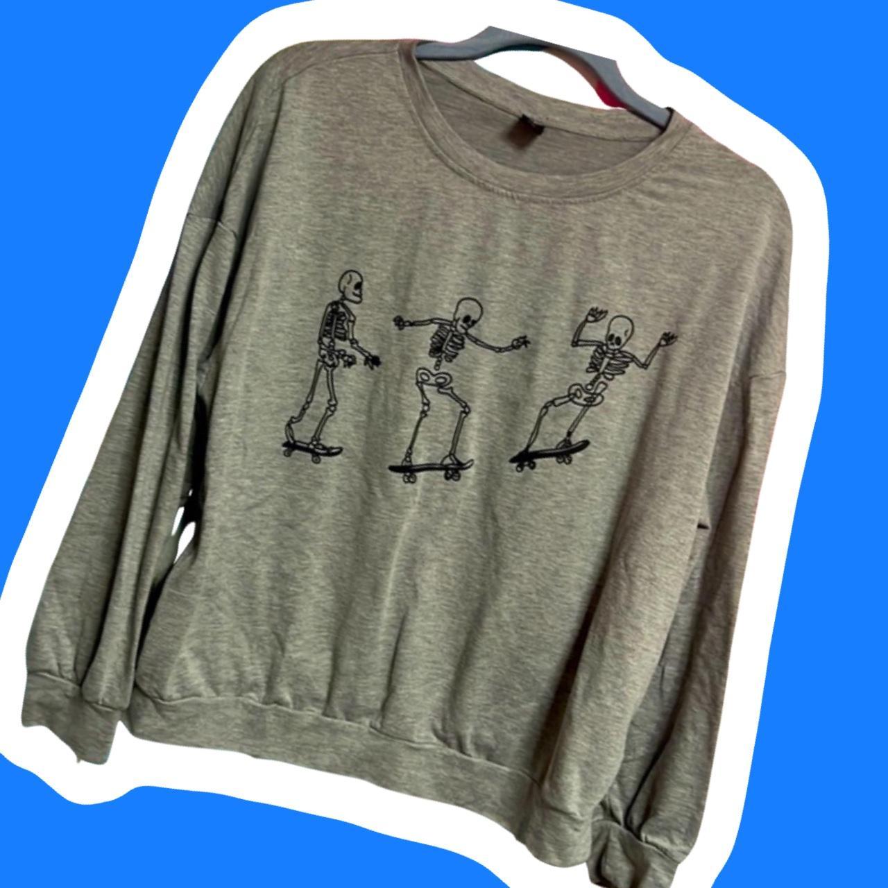 Skeleton riding best sale skateboard sweatshirt