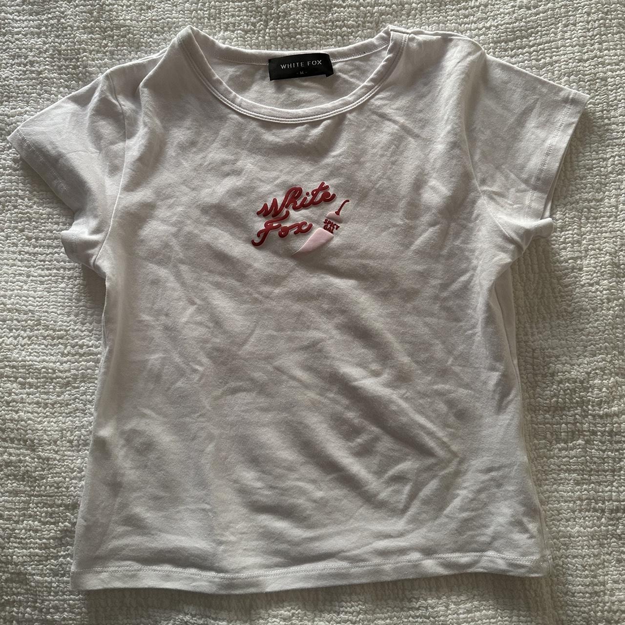 white fox baby tee size medium in excellent... - Depop