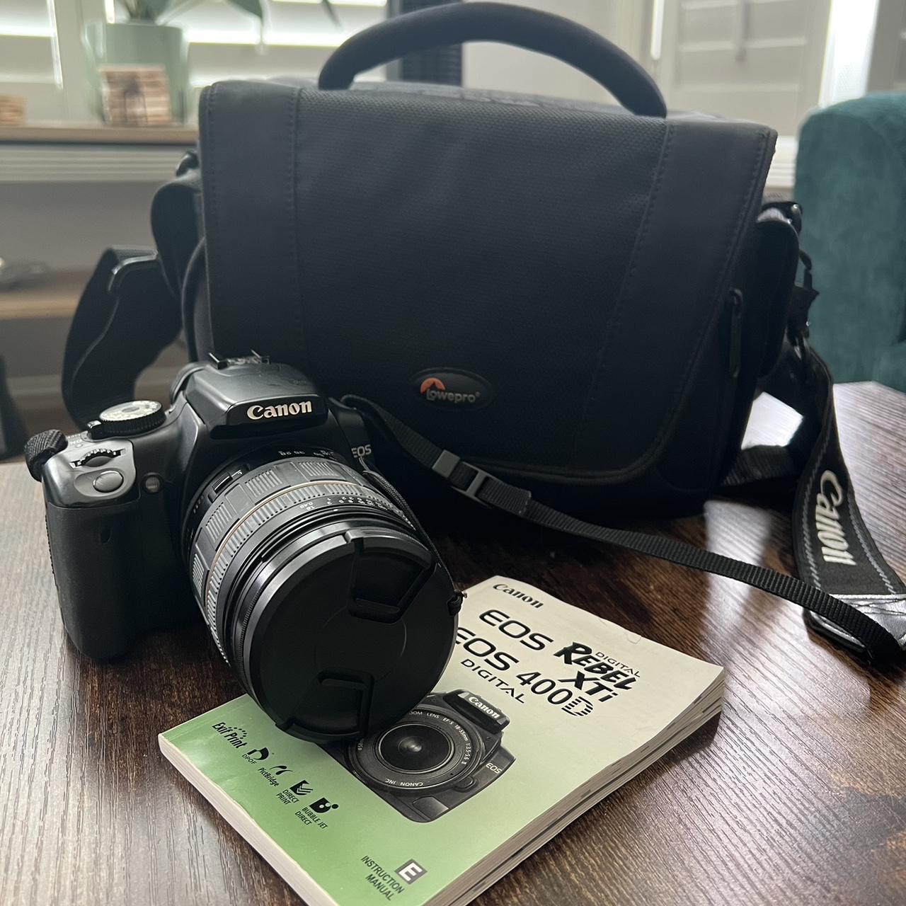 Canon Rebel XTI Includes camera, 3 memory cards,... Depop