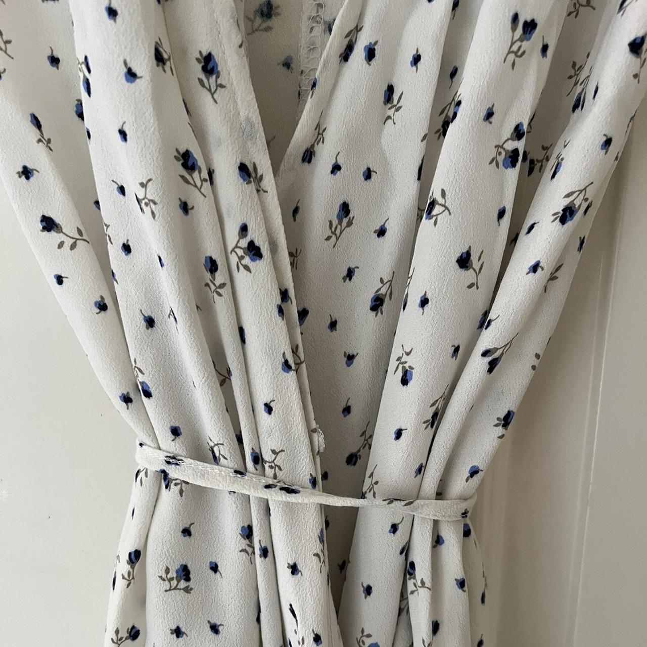 Brandy Melville Dainty Blue floral dress with tie... Depop