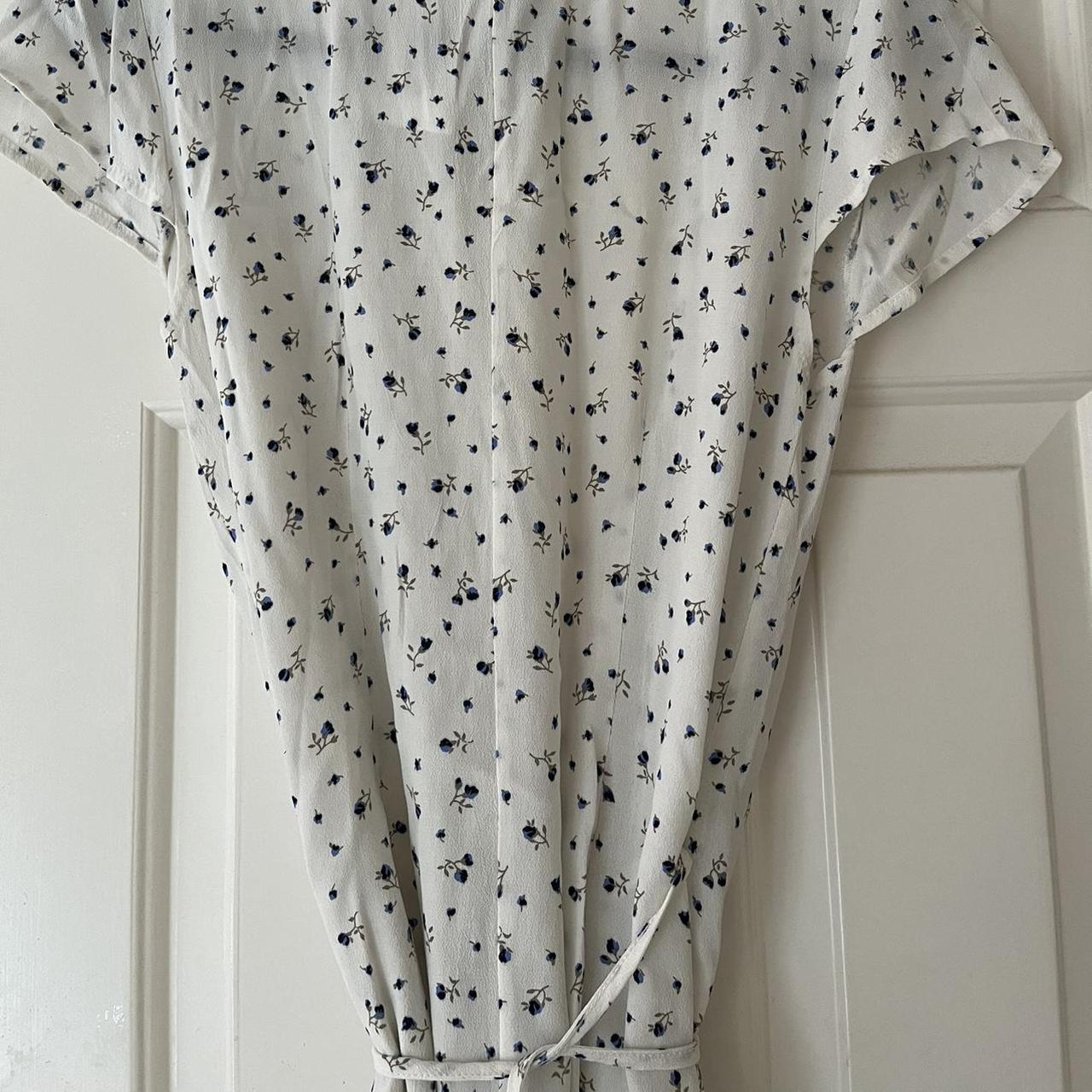 Brandy Melville Dainty Blue floral dress with tie... Depop