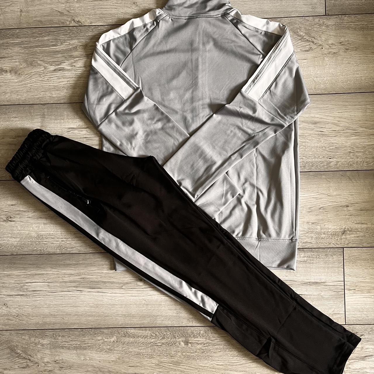 grey nike track suit