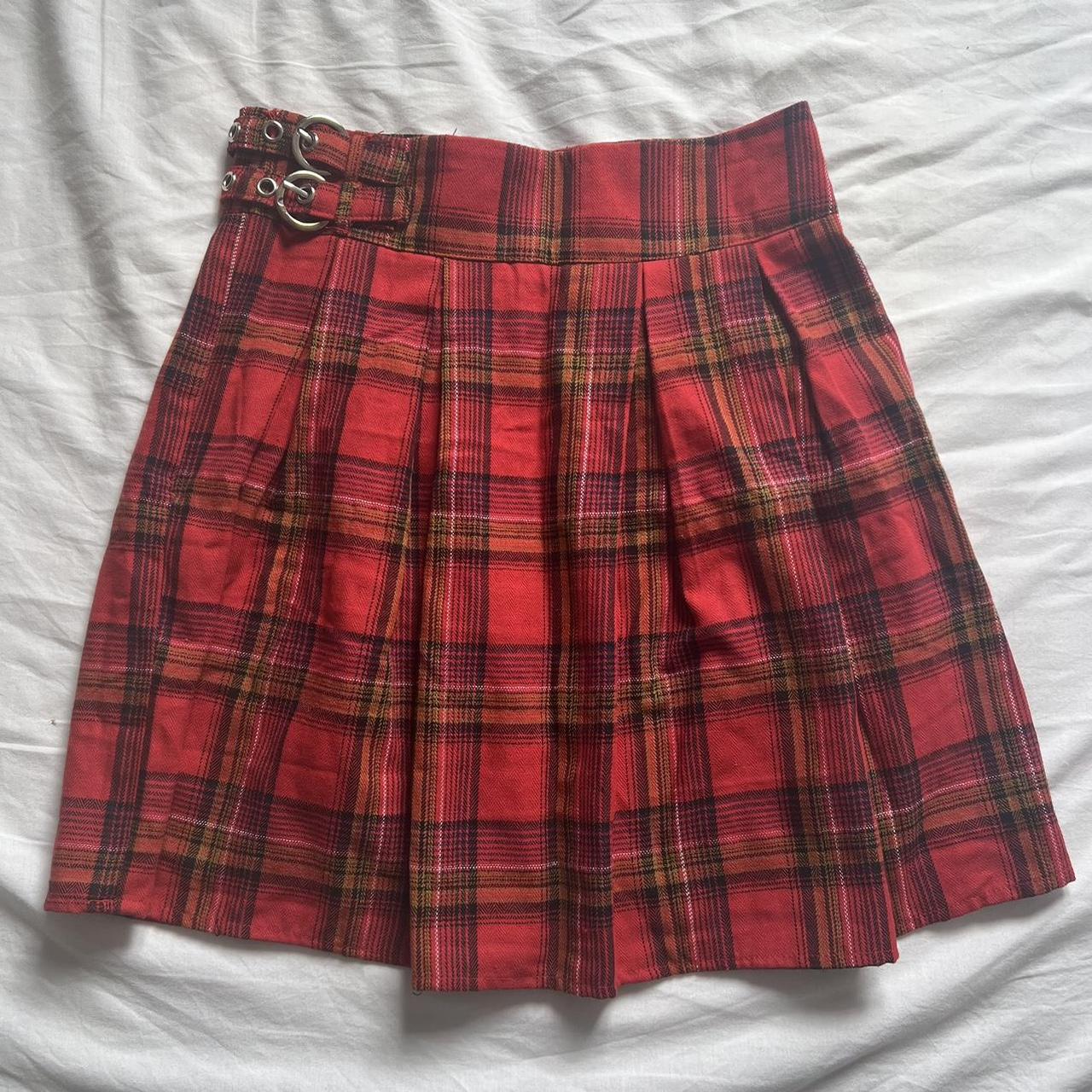 Red chequered pleated skirt with silver buckles. UK... - Depop
