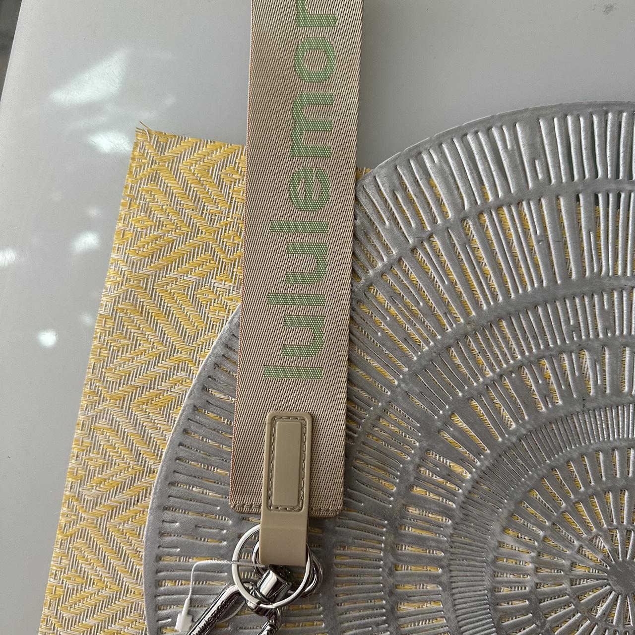 Beige & Green Lululemon keychain I have 3 of these... - Depop