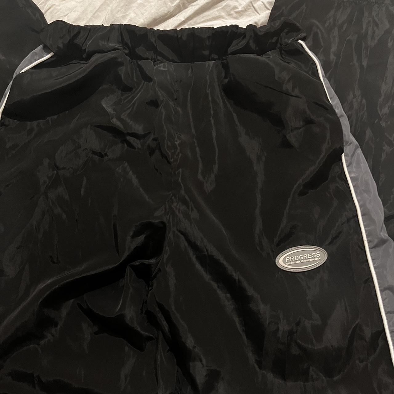 oversized swoosh windrunner