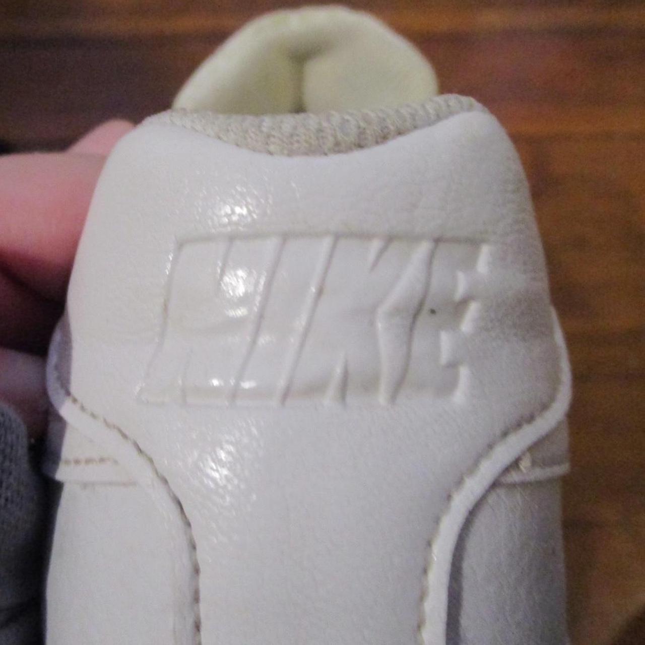 white low top nike sneakers