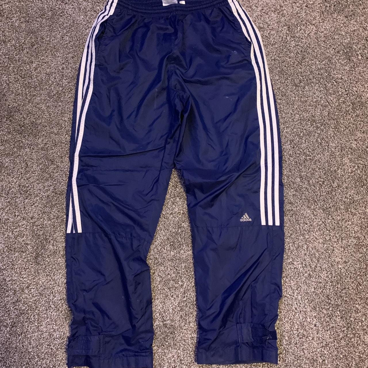 Vintage navy Adidas track pants with minor stains on... - Depop