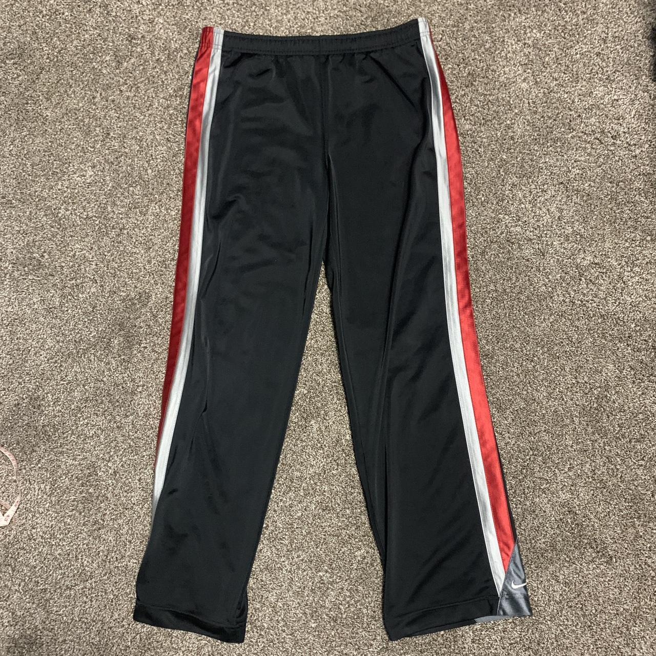 Early 2000s Nike black and red sweatpants in very...
