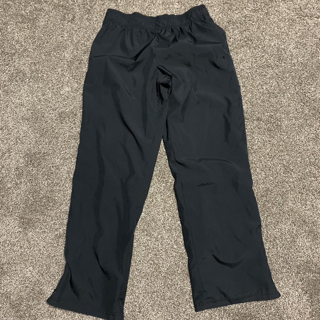 Vintage all black champion track pants in very good... - Depop