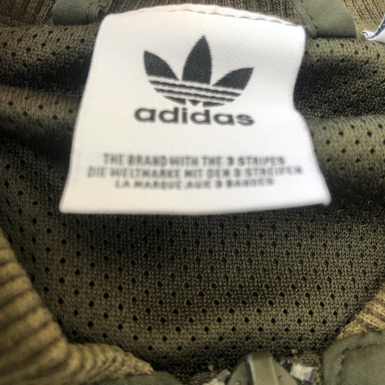 dark green adidas sst track top - Depop