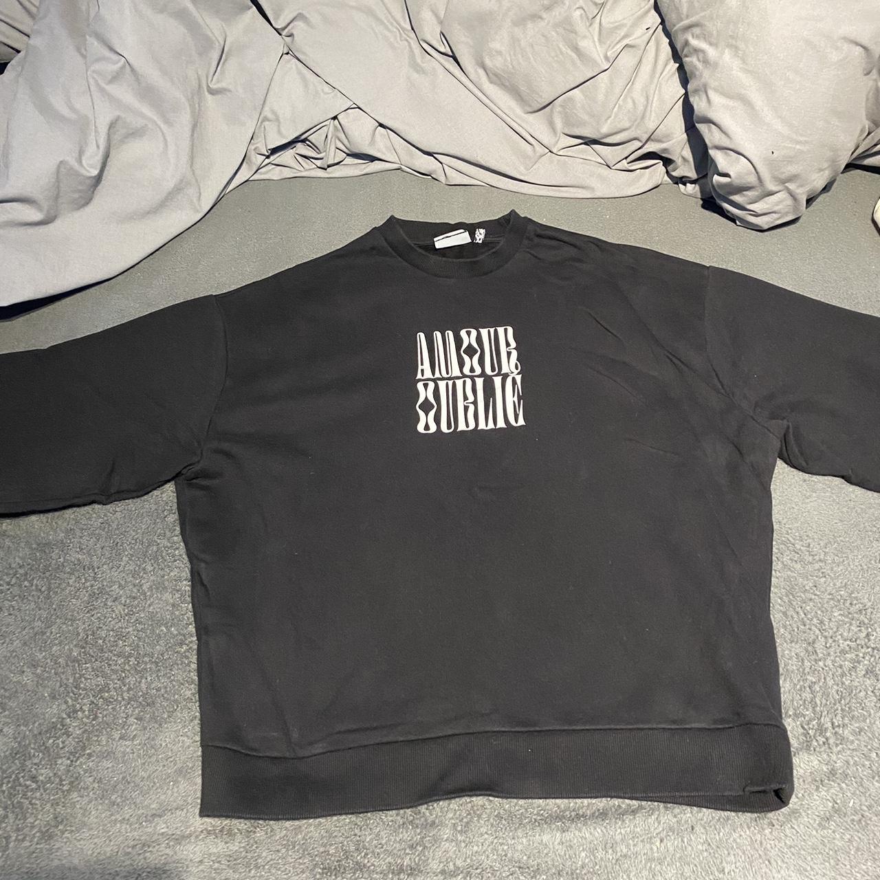 Black sweatshirt with white writing best sale