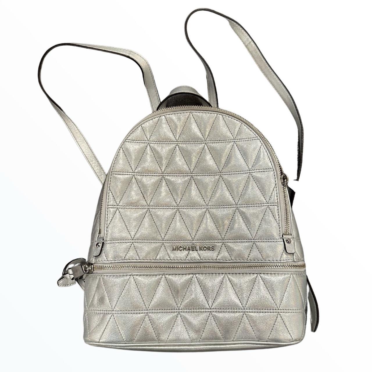 Michael kors silver backpack hotsell