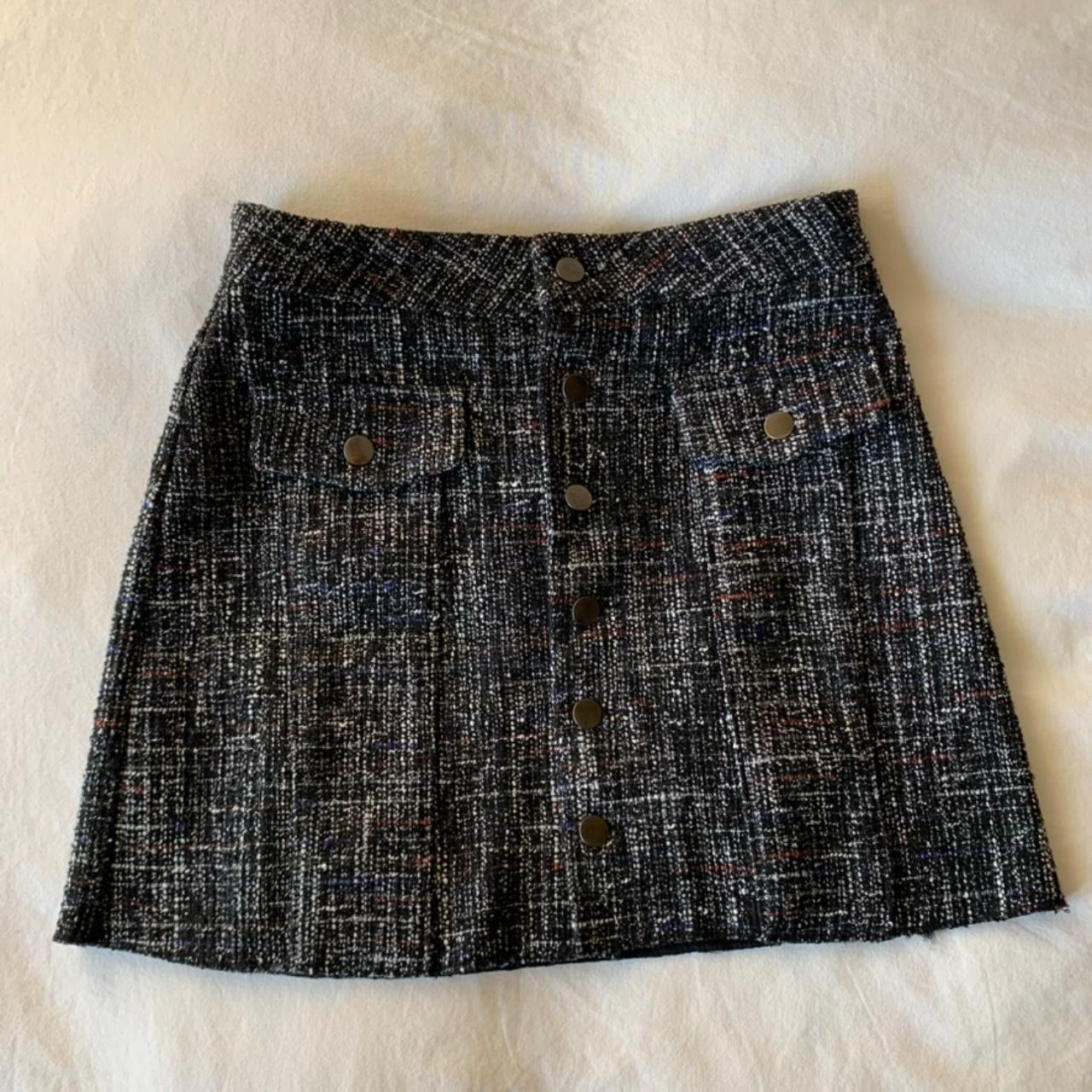 Black tweed miniskirt with multicolor details Depop