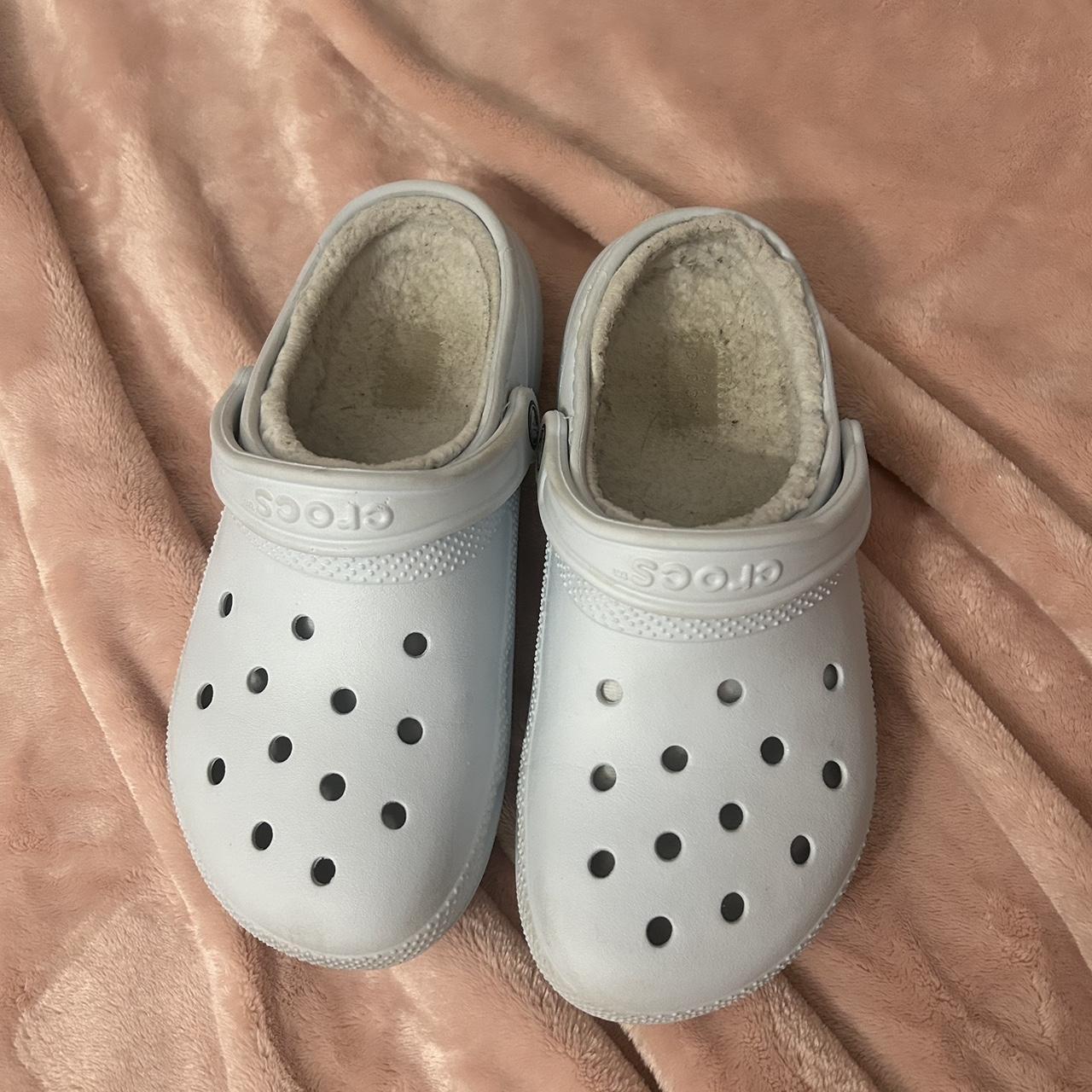 Light blue fuzzy crocs loved and only need a little. Depop