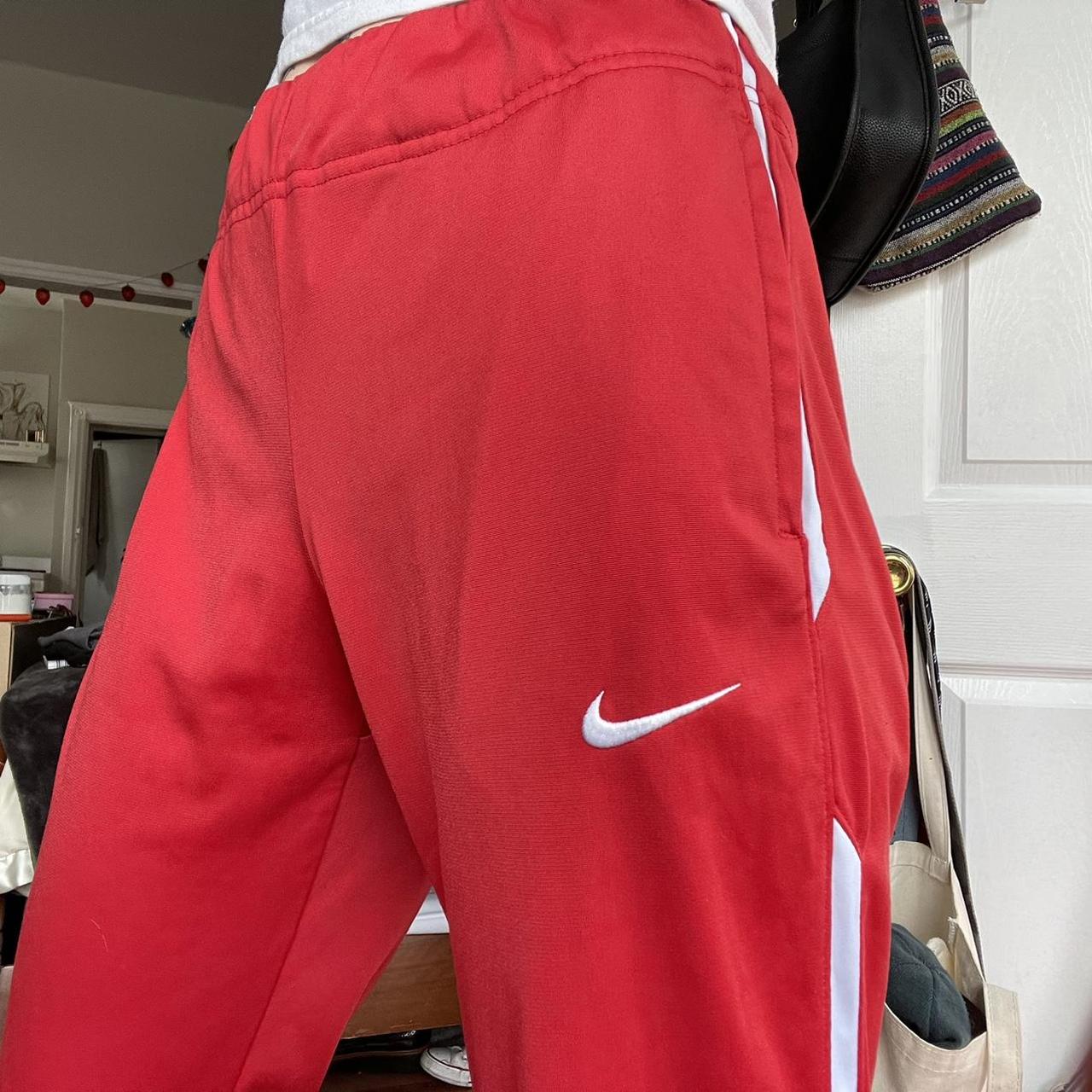 red nike jogging bottoms