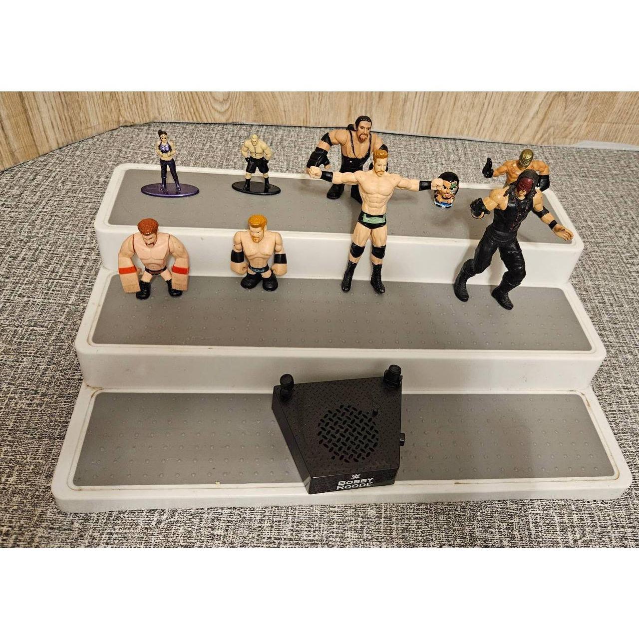 Small wwe best sale wrestling figures