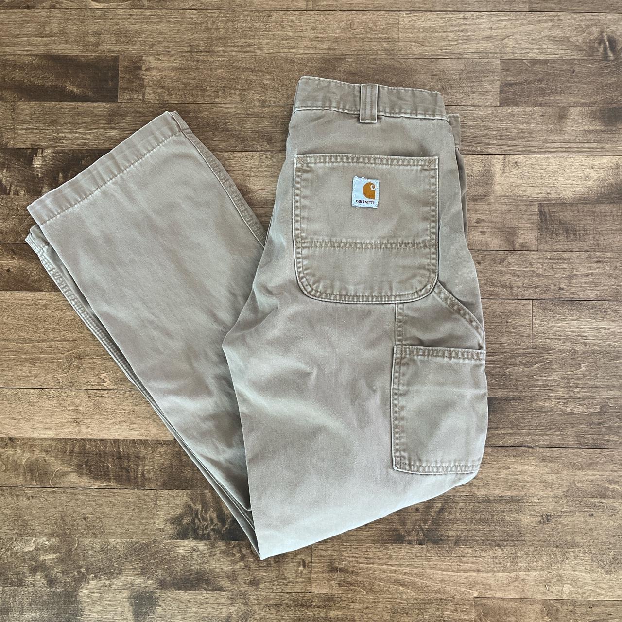 Tan carharrt pants, size 32x32, minor paint stain - Depop