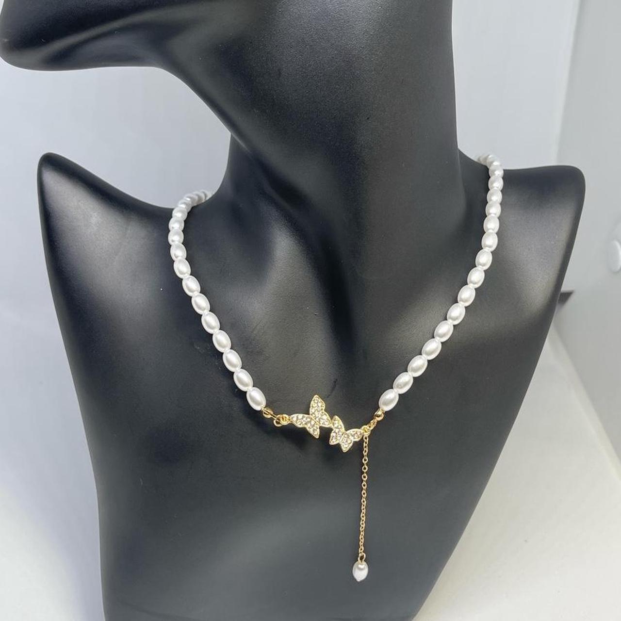 Pearl beaded butterfly detail design necklace... Depop