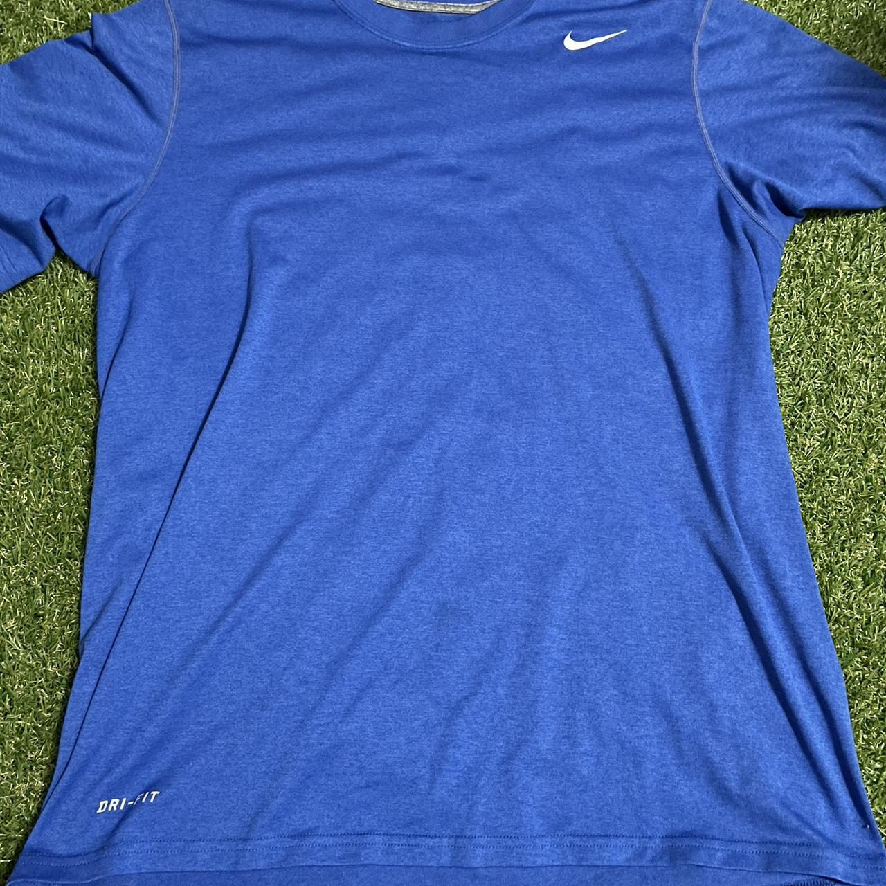 blue and white nike shirt womens