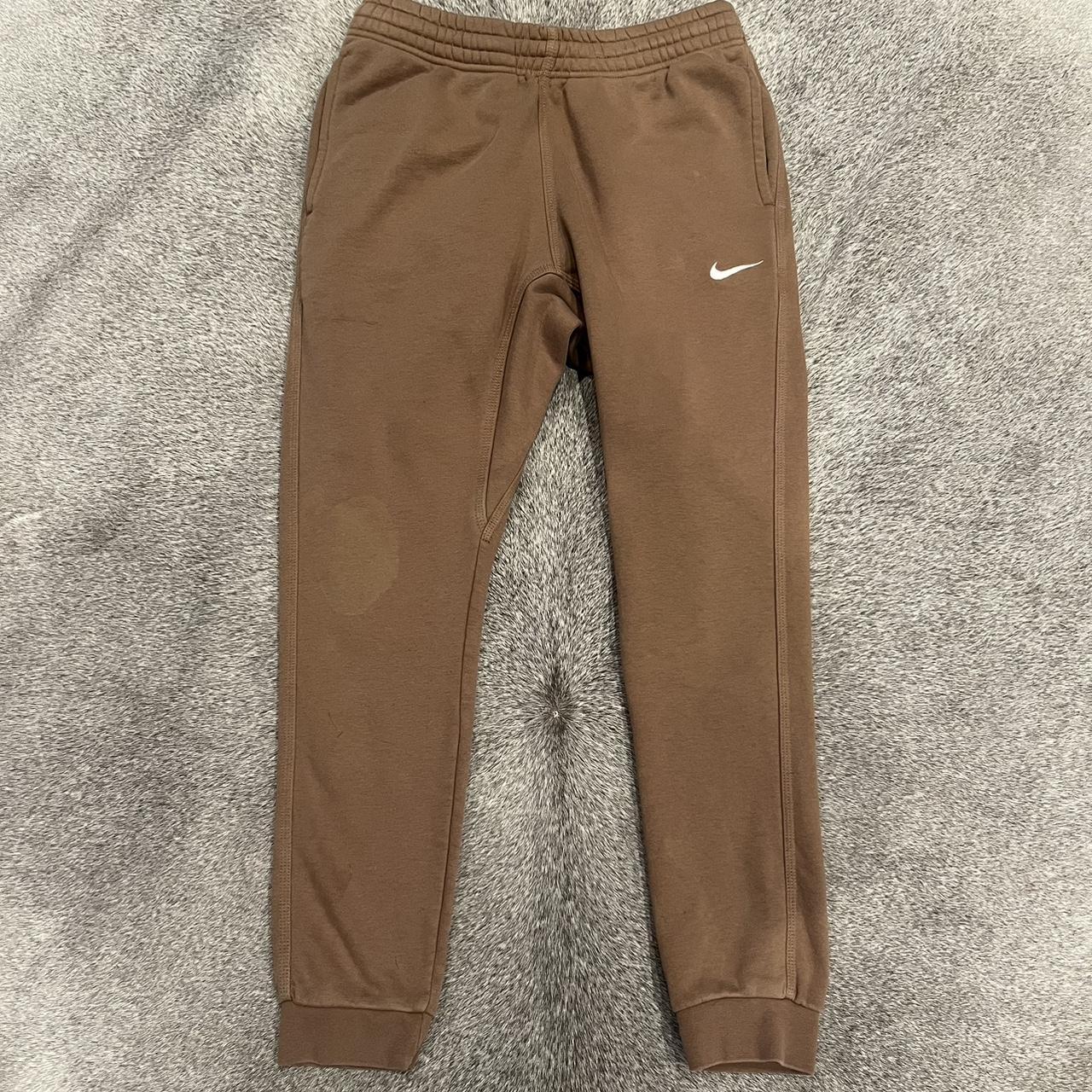 Brown Nike Sweatpants Stain on right knee as... - Depop