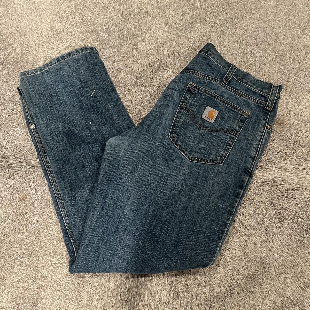 Jean Blue Carhartt Pants with some paint stains Size... - Depop