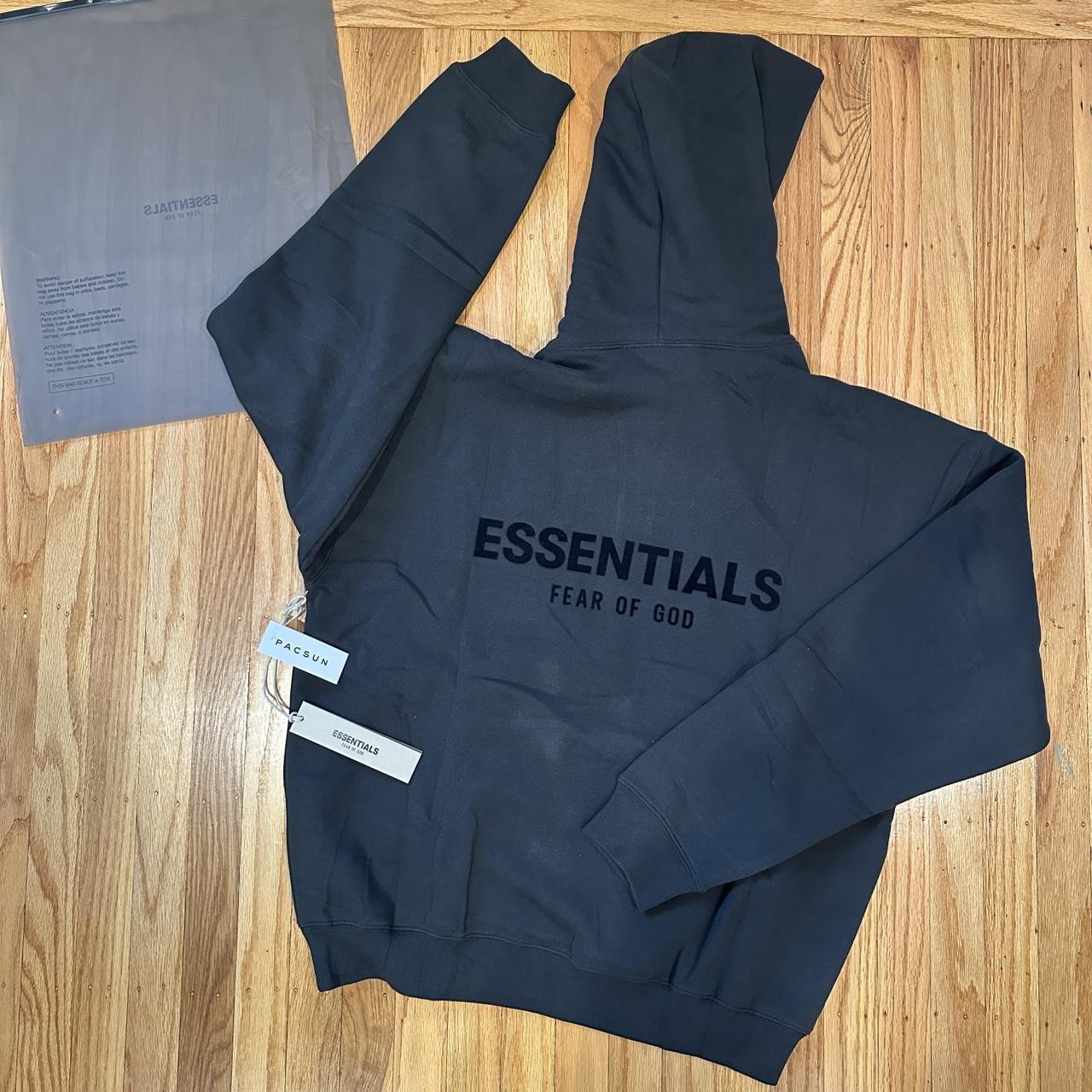 Essentials black hoodie Run big Normally Ship out... | Depop