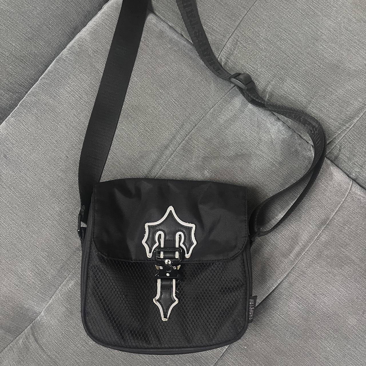 Used reflective trapstar bag. Depop