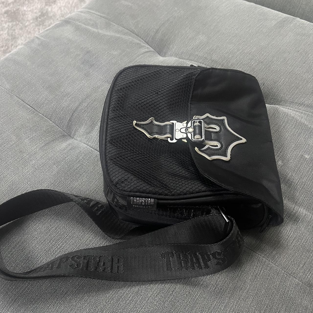Used reflective trapstar bag. Depop