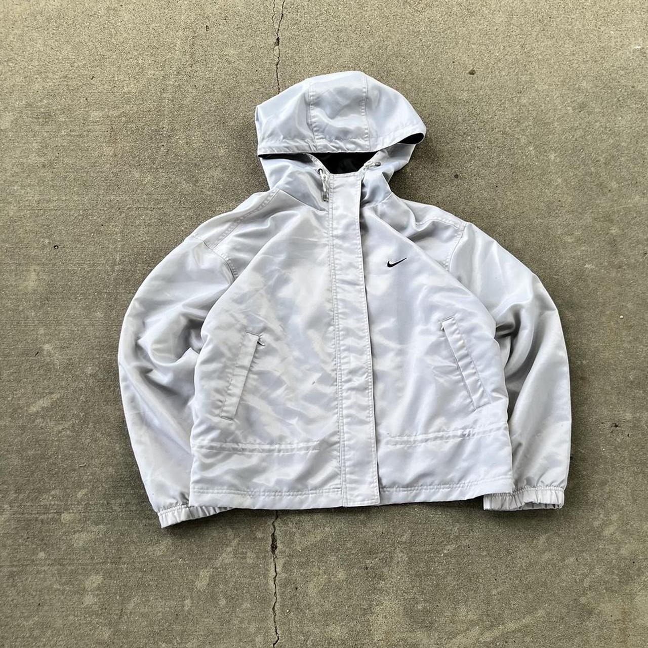 90's Nike Rain Jacket with a Nike spell out on the... Depop