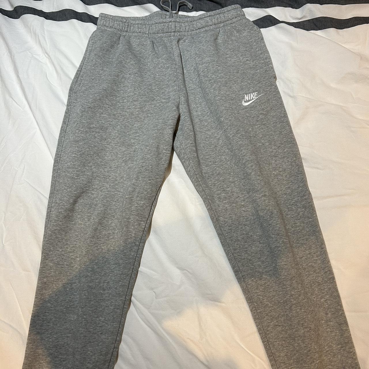 grey nike joggers perfect condition ribbed cuff... - Depop