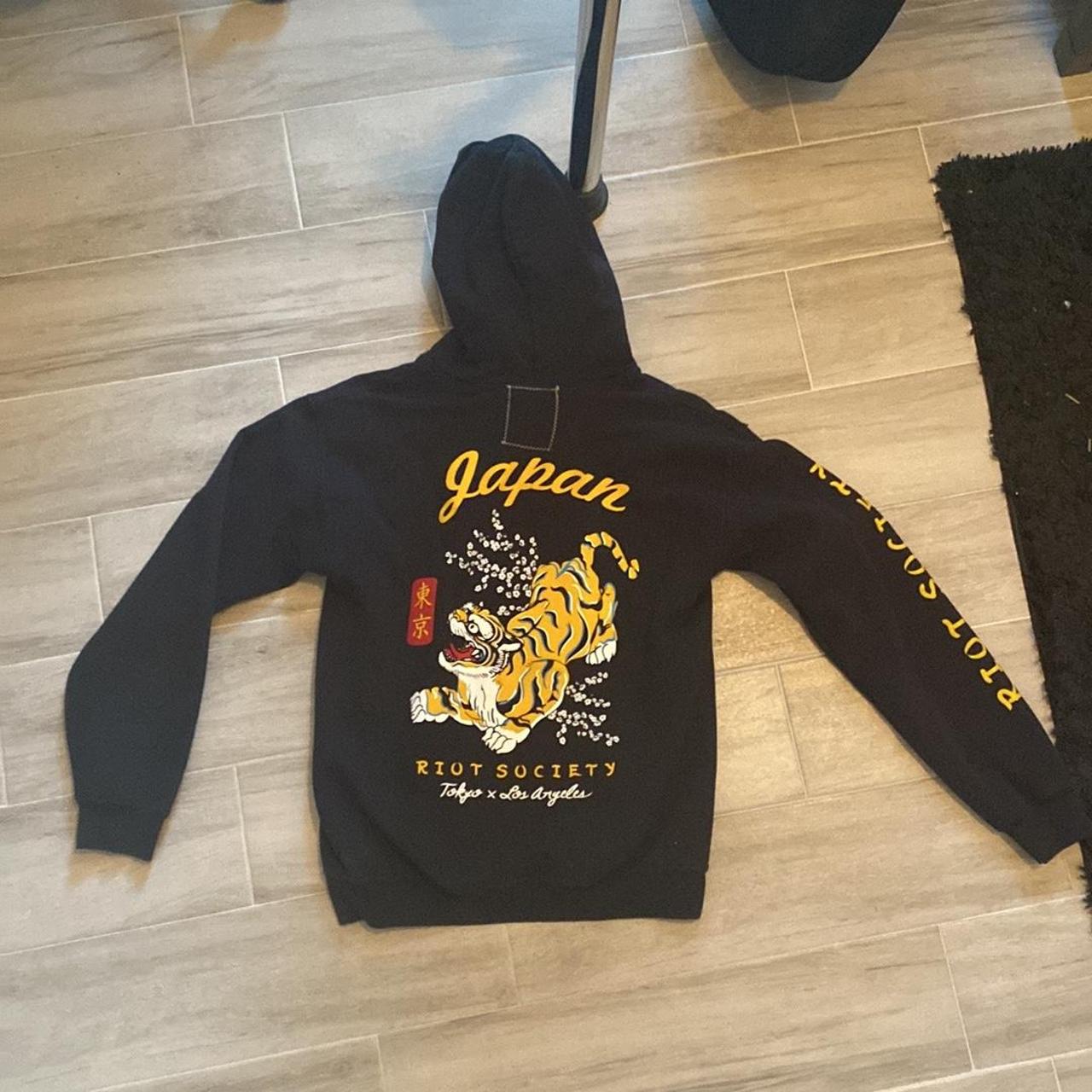 black riot society hoodie with tiger on back and