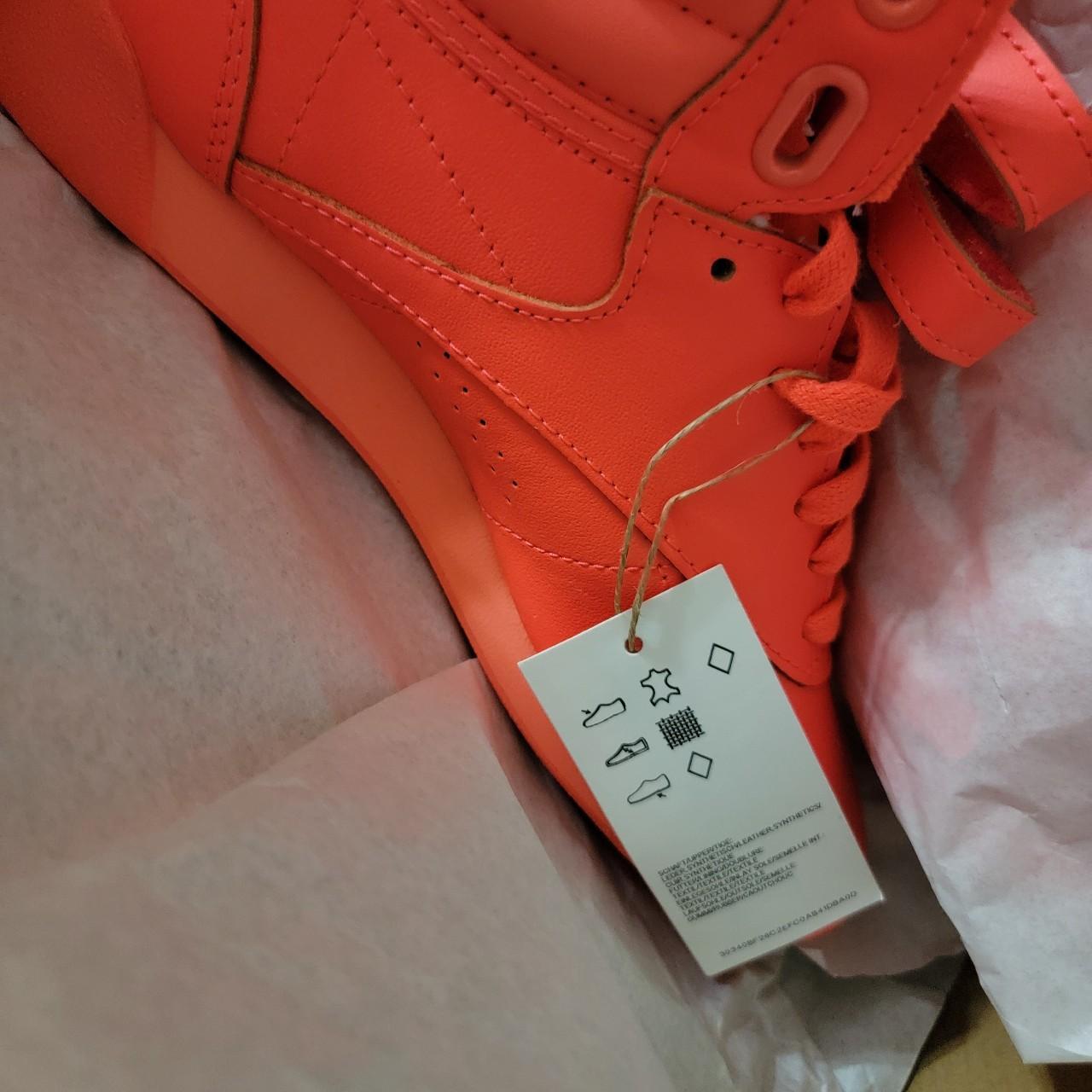 Reebok freestyle deals hi womens orange