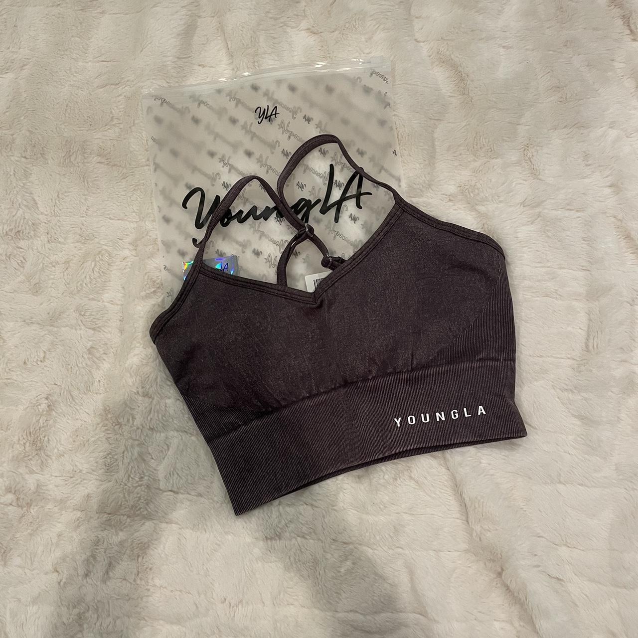 Youngla sports bra fitting very good and never worn,... Depop