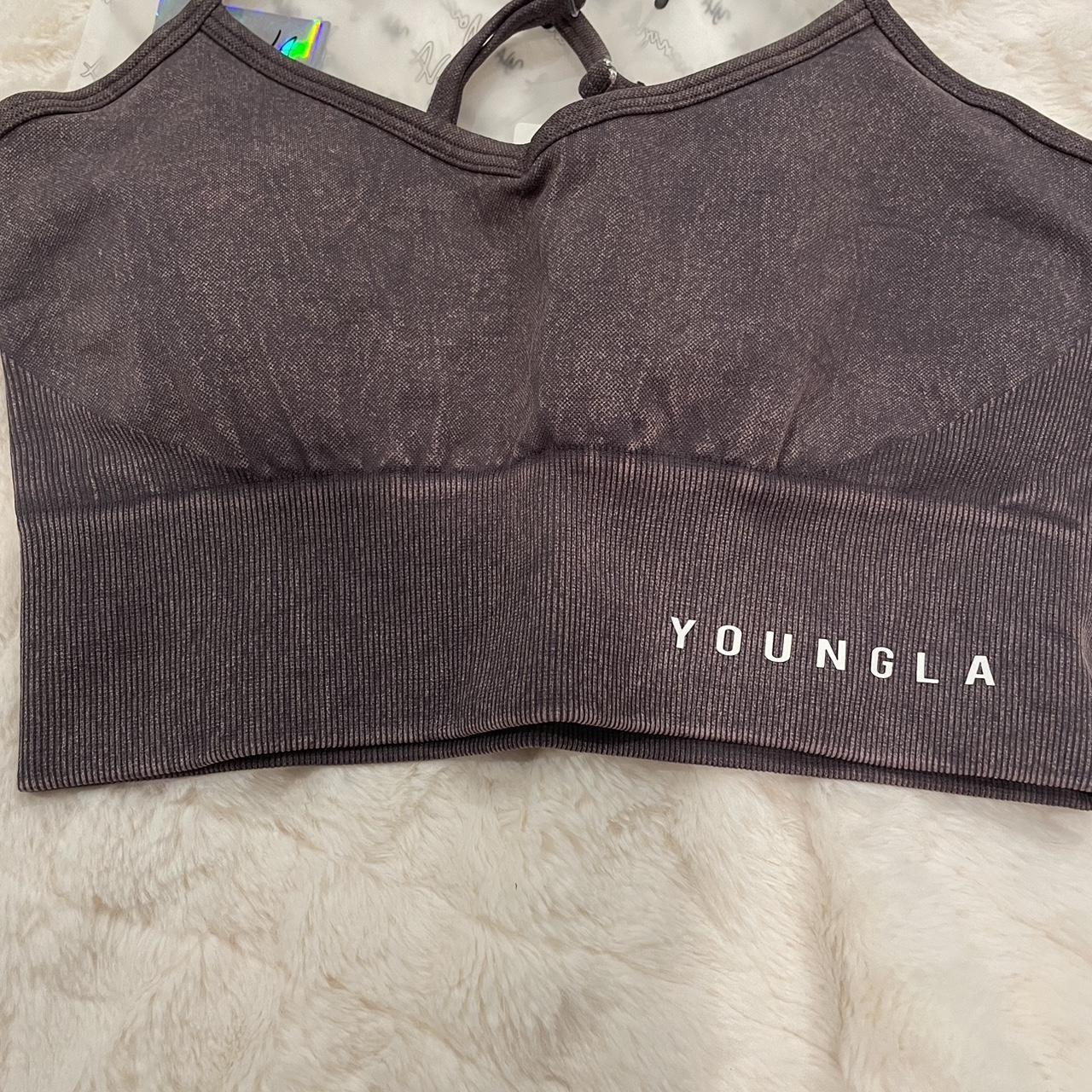Youngla sports bra fitting very good and never worn,... Depop