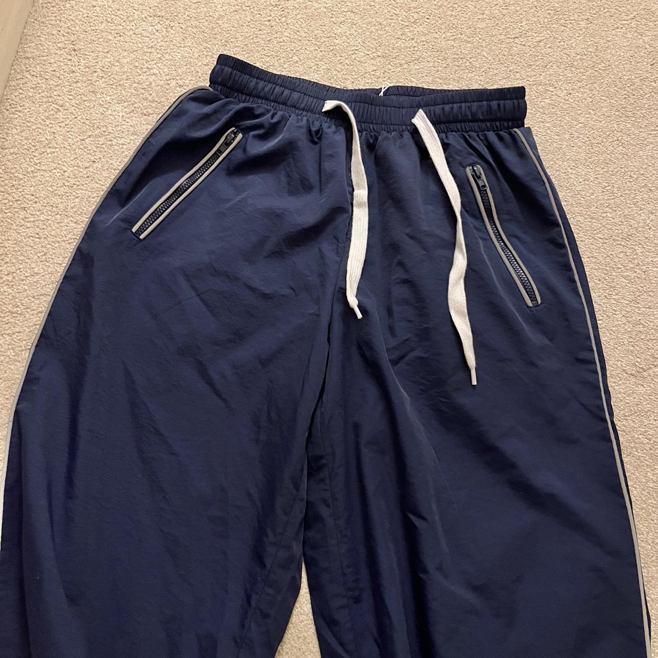 navy track pants glow in the dark perfect for sport... - Depop