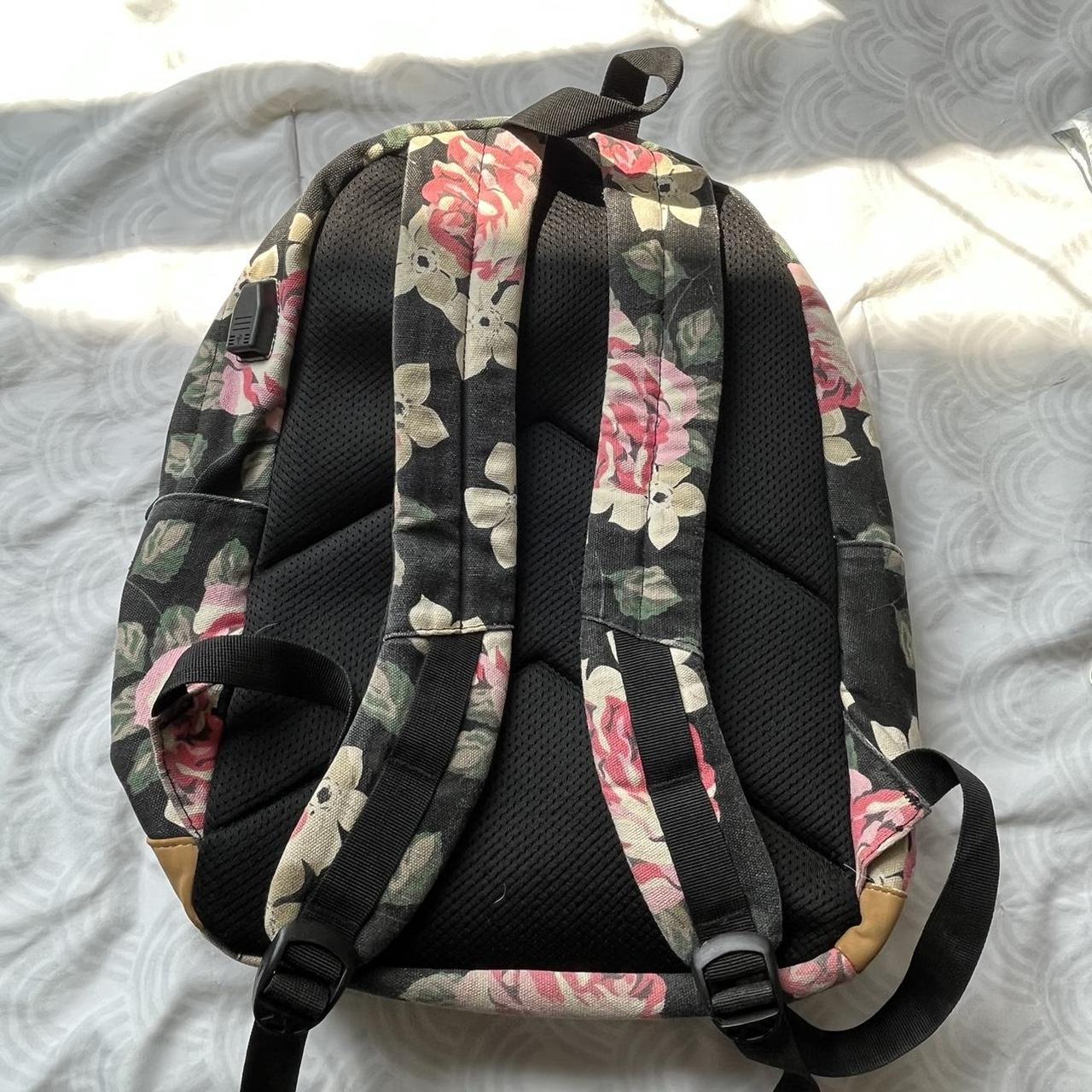 floral backpack color is slightly faded no flaws... - Depop