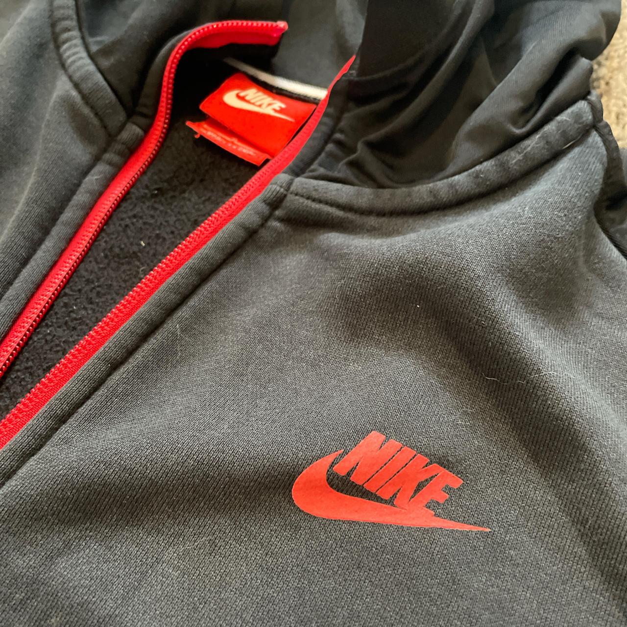 Grey black and red Nike jumper Size L but baggy fit Depop
