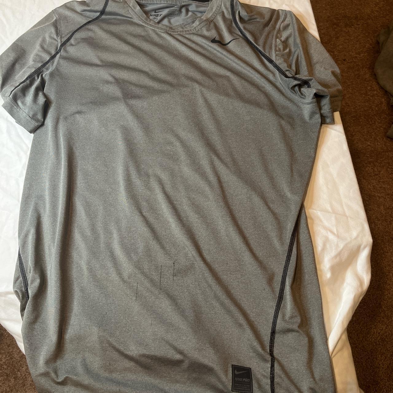 Grey Nike pro shirt Size Men’s... - Depop