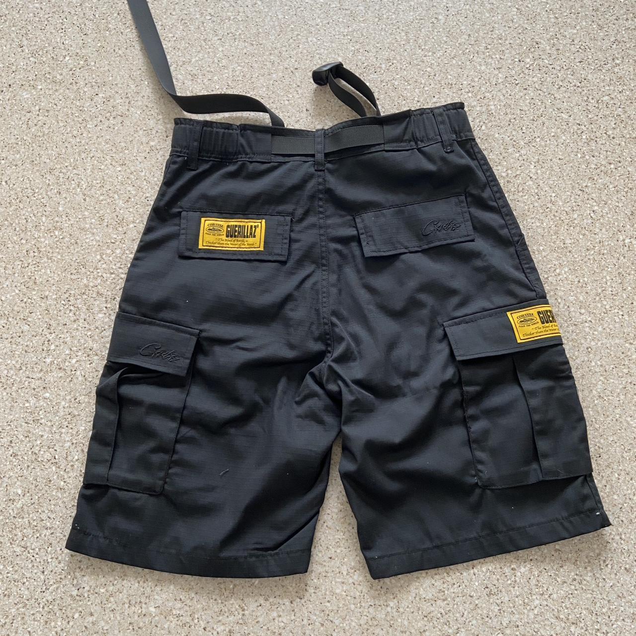 Corteiz Men's Black and Yellow Shorts | Depop