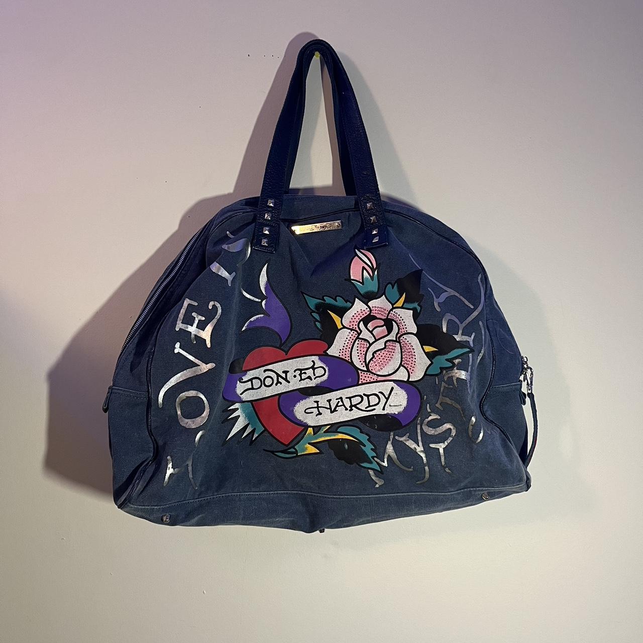 Ed hardy travel bag, denim material, have some stain... - Depop