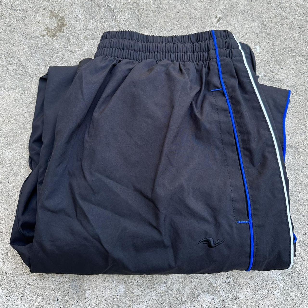 black athletic works track pants tagged medium, fit... - Depop