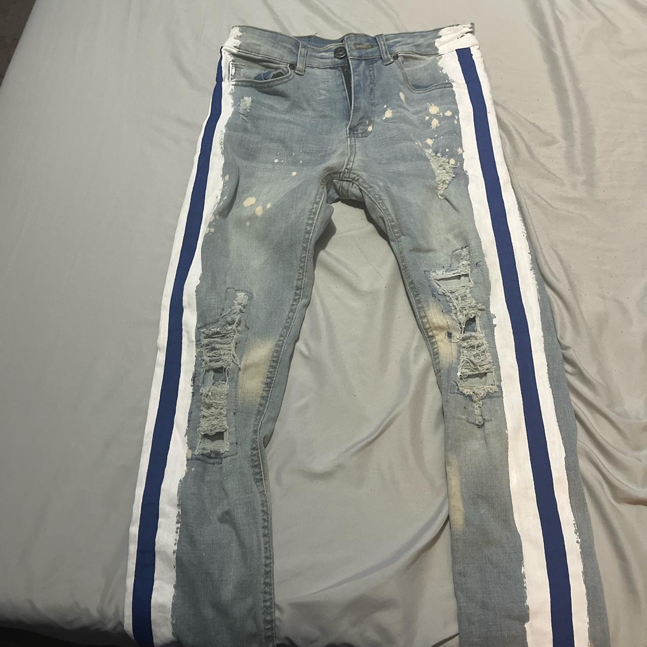 Blue ripped jeans with blue stripe along the side -... - Depop