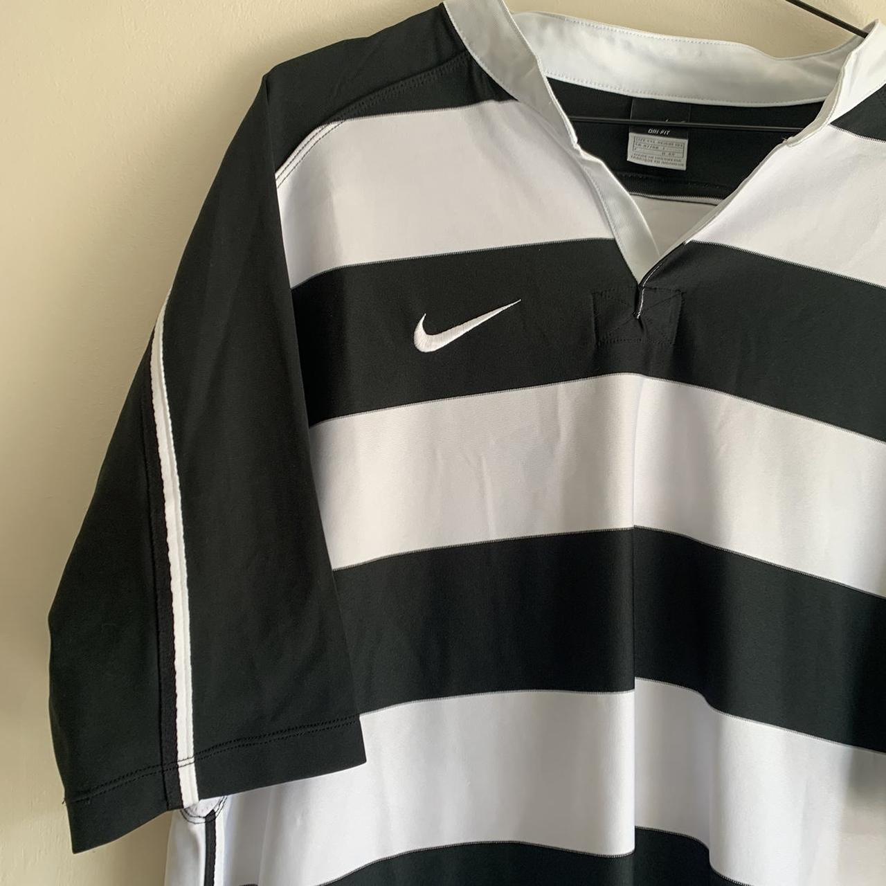 nike rugby shirt , with black and white stripe dry... Depop