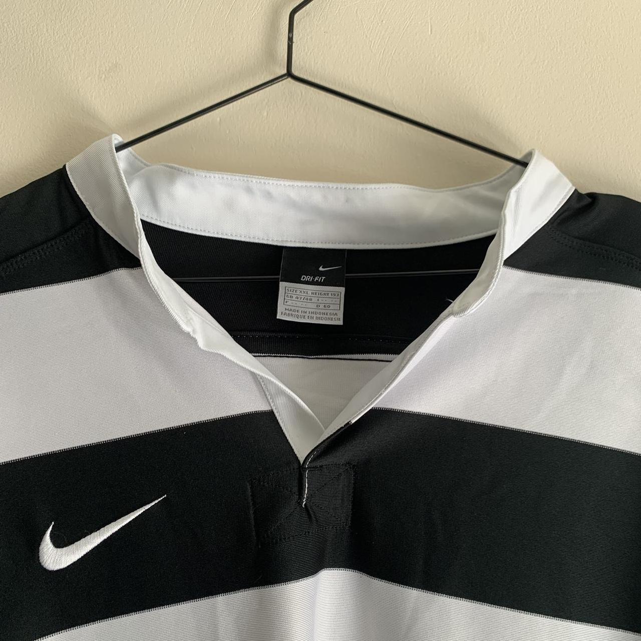 nike rugby shirt , with black and white stripe dry... Depop