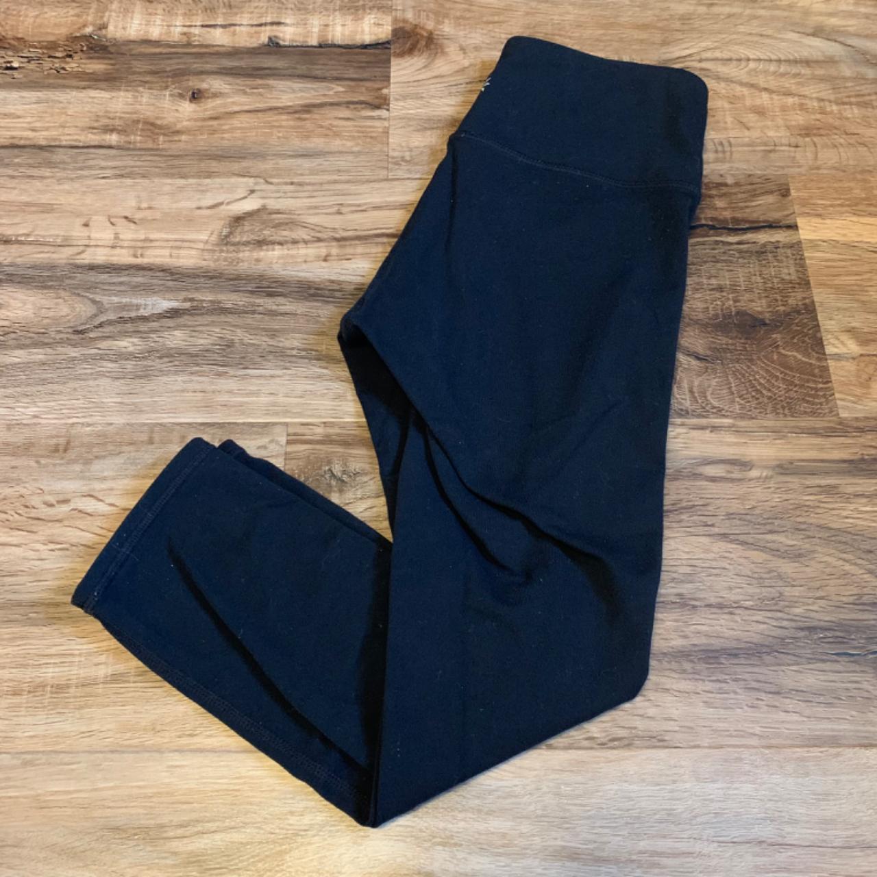 Athleta 3/4 black leggings with interior key pocket.