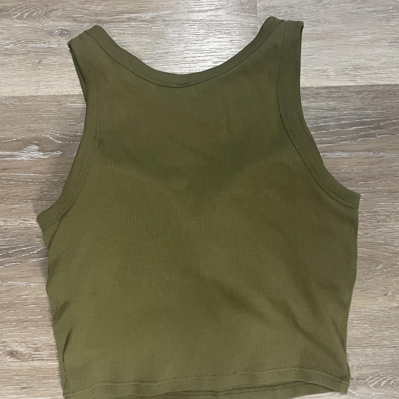 Green ribbed padded crop tank from Uniqlo. Worn... - Depop