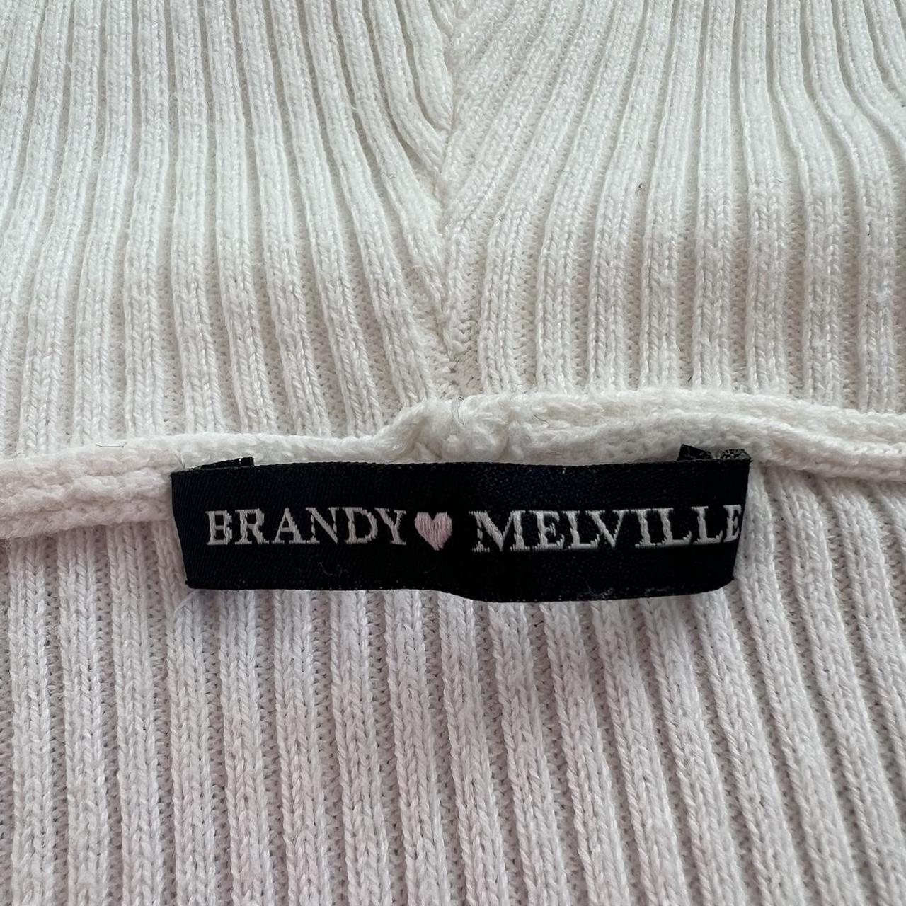 brandy melville white zip up... Depop